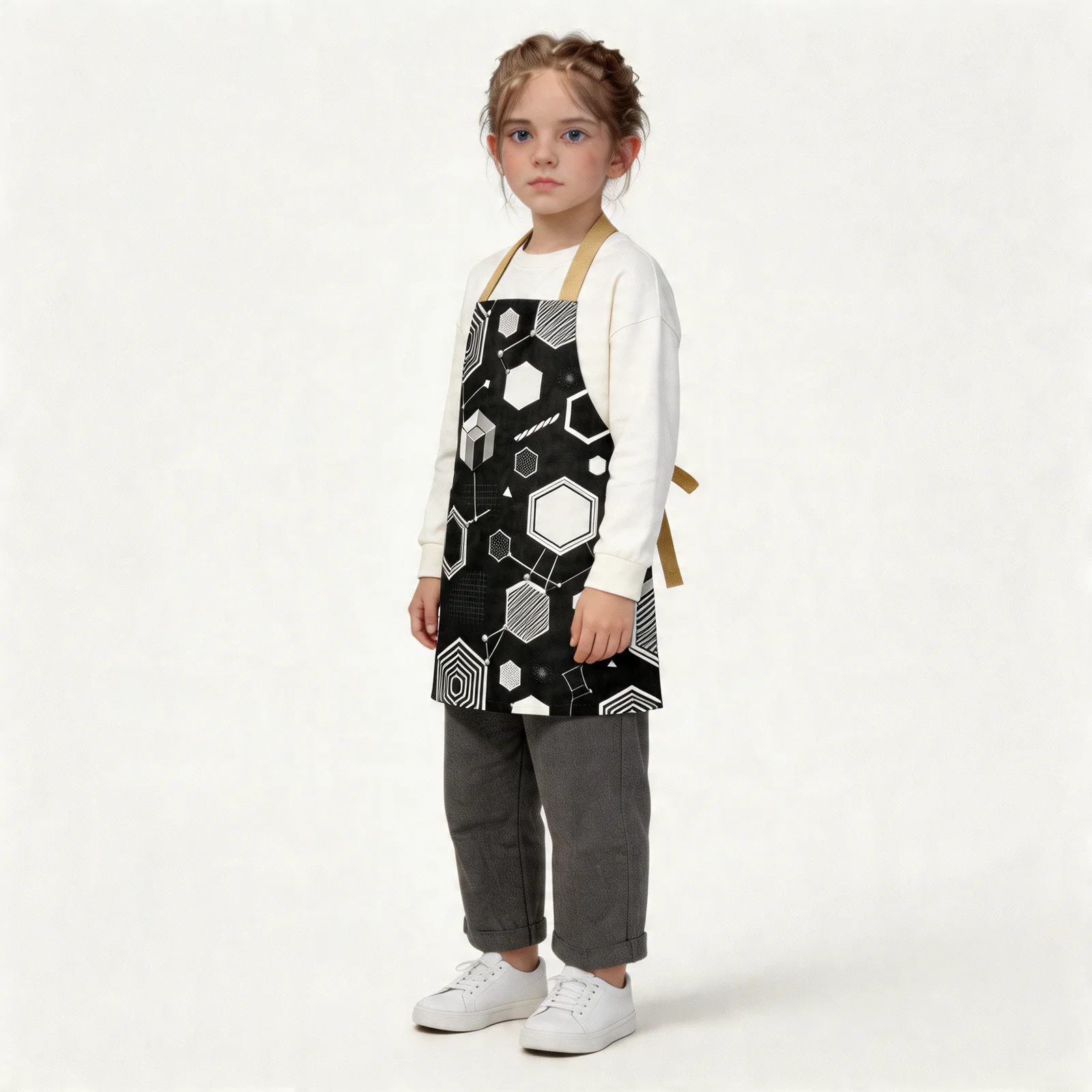 Monochrome Honeycomb Matrix All-Over Print Apron — worn by young model